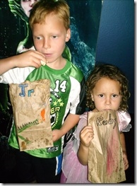 Kids with popcorn bags
