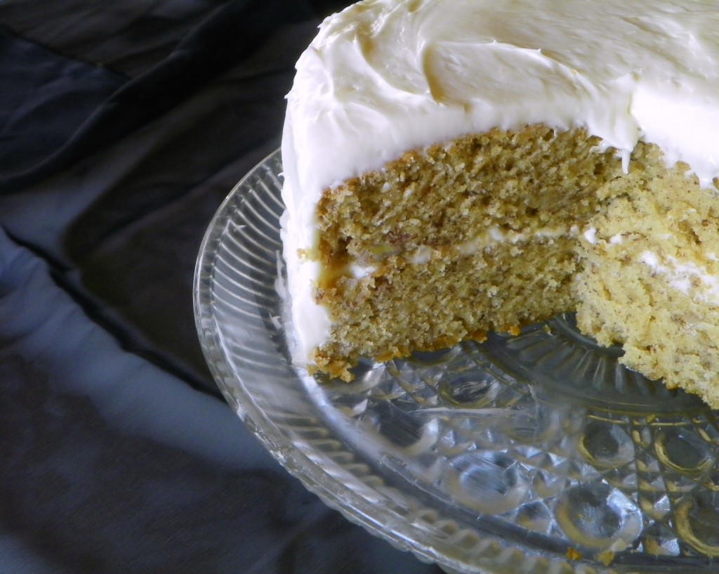 Best Ever Banana Cake on cake plate