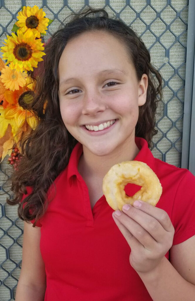 Girl with Entenmann's donut #Entenmanns #EntenMANofTheYear