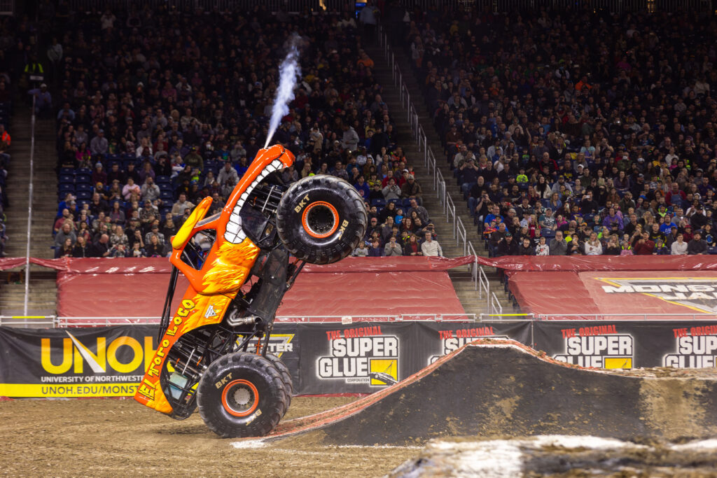 Picture of monster truck going over ramp